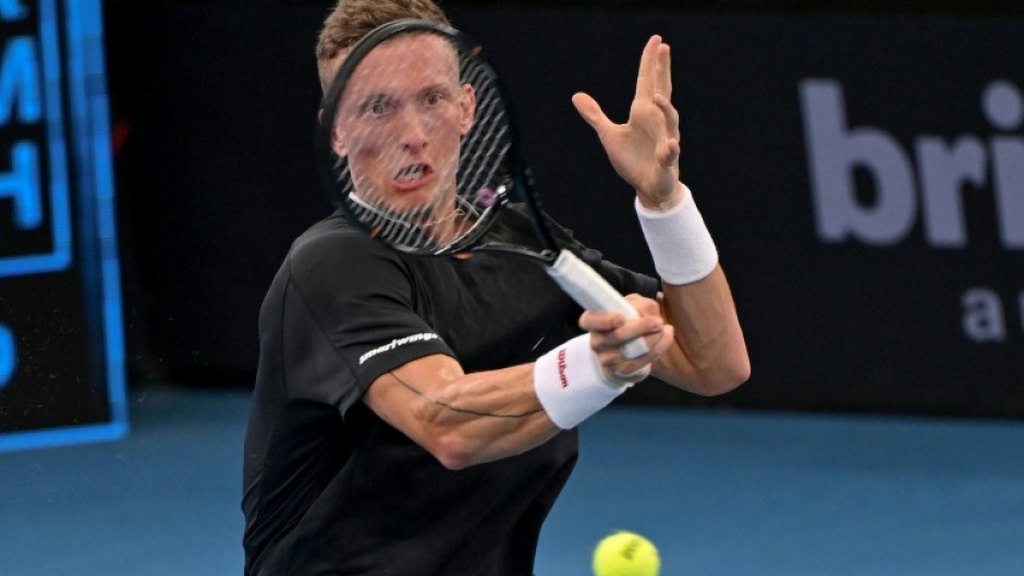 Jiri Lehecka hits a return to fellow Czech Tomas Machac in Brisbane