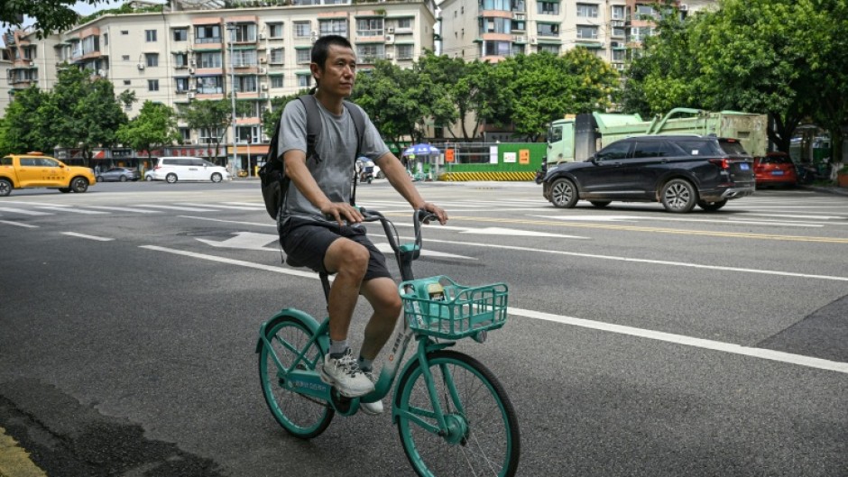 Author Hu Anyan was one of the millions of delivery drivers powering China's retail giants