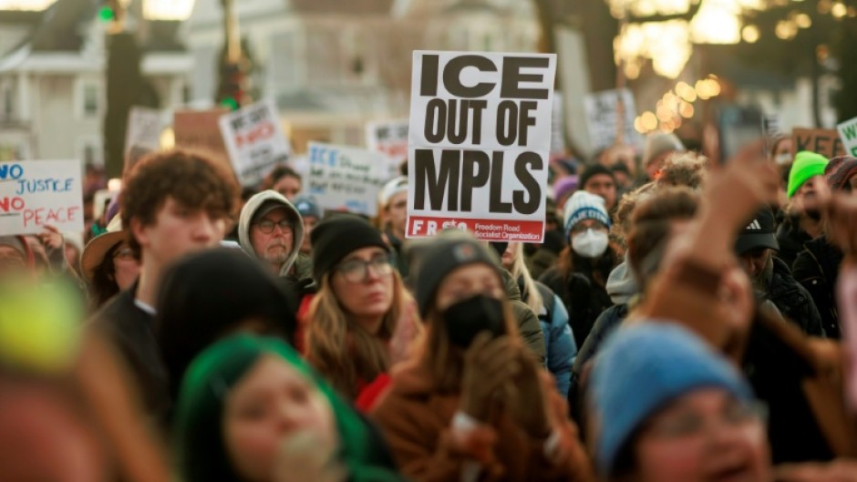 Thousands of protesters took to the frigid streets of Minneapolis after the shooting, holding signs reading 'ICE out of MPLS,' a common abbreviation for the city