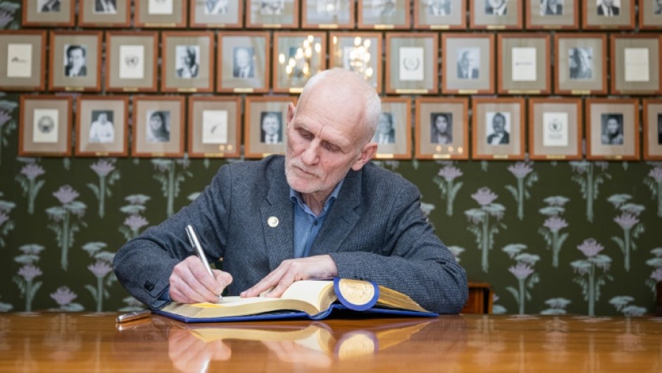 During his visit to the Nobel foundation's headquarters Bialiatski signed the guest book