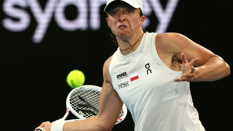 Poland’s Iga Swiatek hits a return to Australia’s Maya Joint