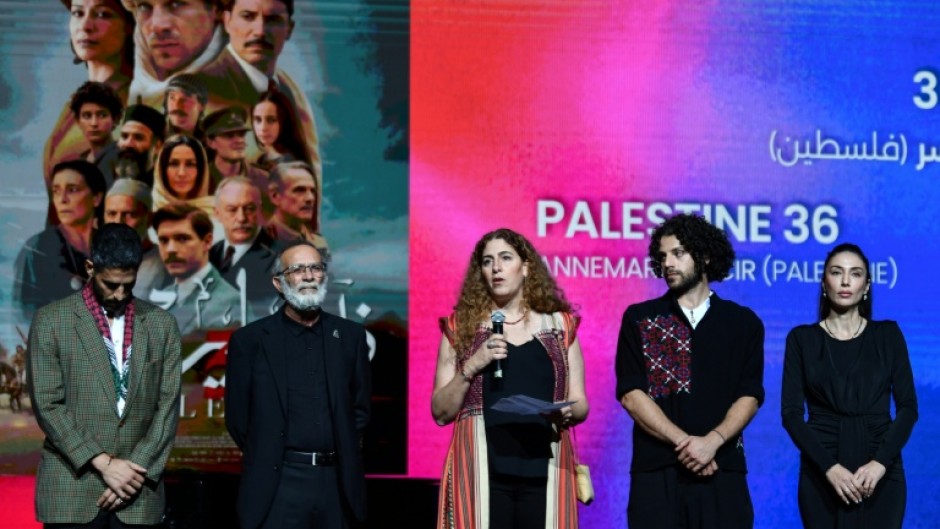 Director Annemarie Jacir with members of the cast