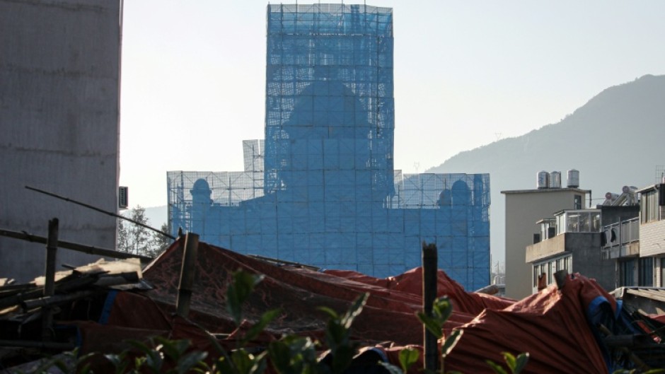 The Yayang church is seen covered in scaffolding in Yayang township, Wenzhou city, in eastern China's Zhejiang province on January 9, 2026