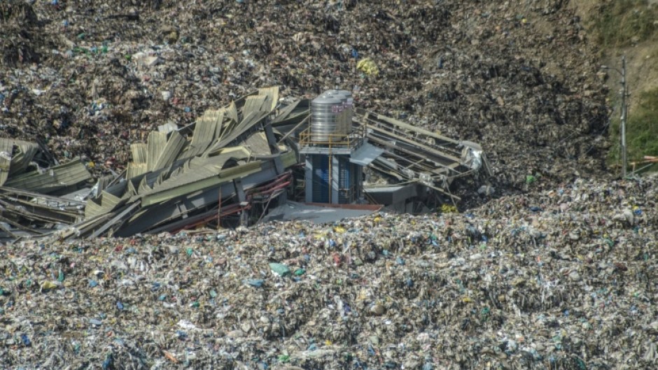 An aerial view of the aftermath of a trash landslide at the landfill in in Cebu City that buried dozens of workers