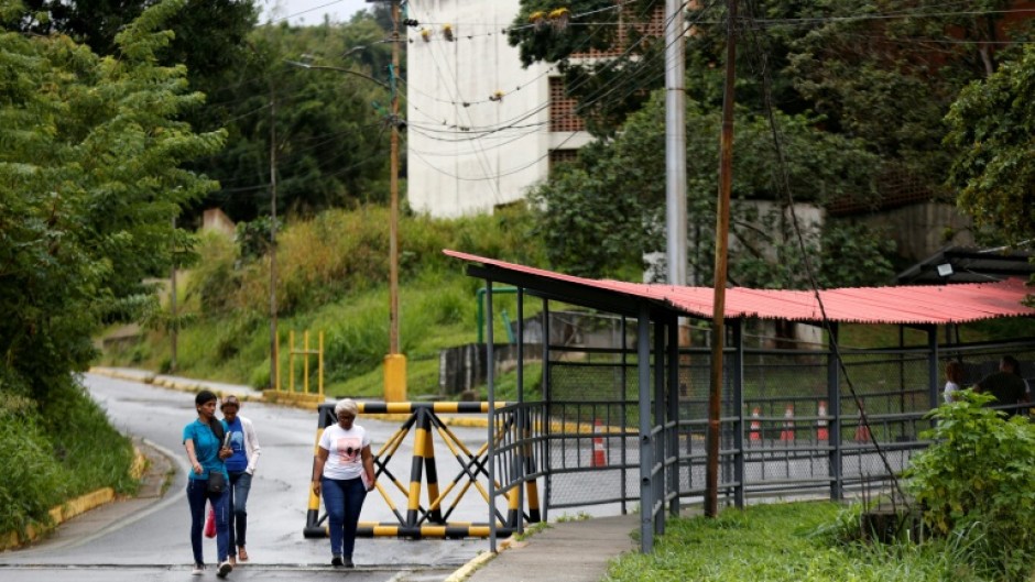 Inmates' relatives waited outside El Rodeo I prison for their loved ones' release