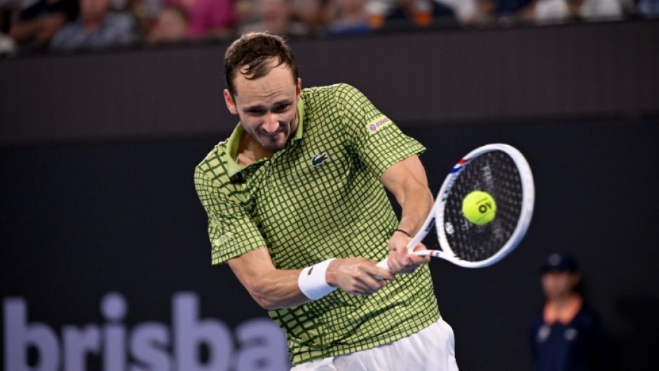 Daniil Medvedev hits a return during his men's singles final against Brandon Nakashima at the Brisbane International