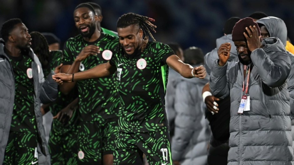 Alex Iwobi celebrates with teammates after Nigeria's AFCON quarter-final win over Algeria in Marrakesh on Saturday