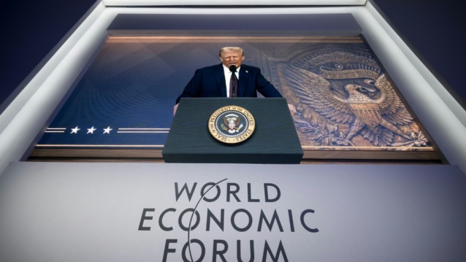 Donald Trump addressing last year's World Economic Forum in Davos via a giant video screen
