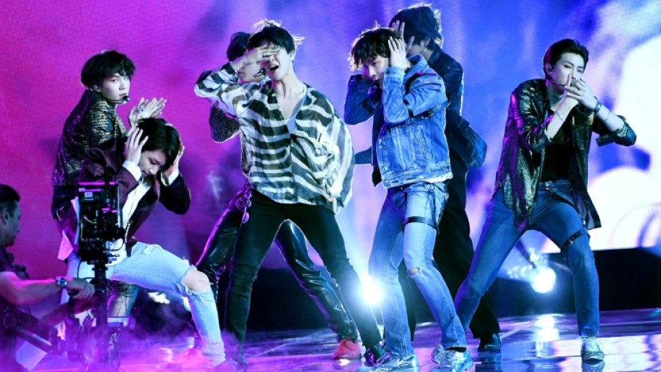 BTS performs onstage during the 2018 Billboard Music Awards at MGM Grand Garden Arena
