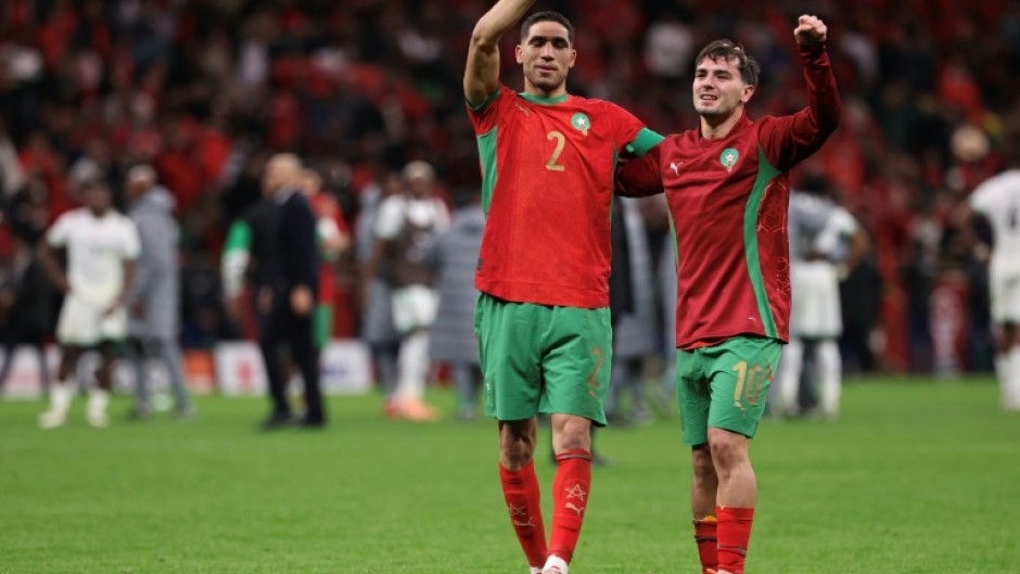 Morocco's Achraf Hakimi and Brahim Diaz celebrate after beating Nigeria on penalties in the semi-finals