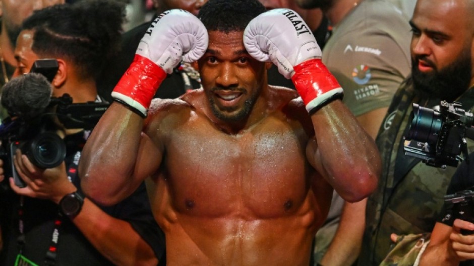 Anthony Joshua escaped with minor injuries from the accident that killed two members of his backroom team