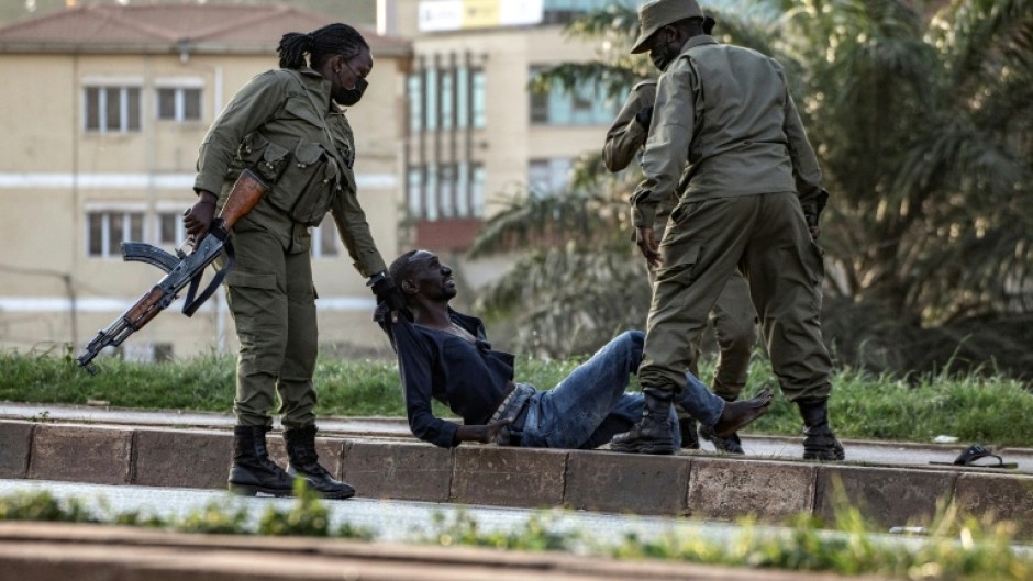 Uganda voted under heavy security presence
