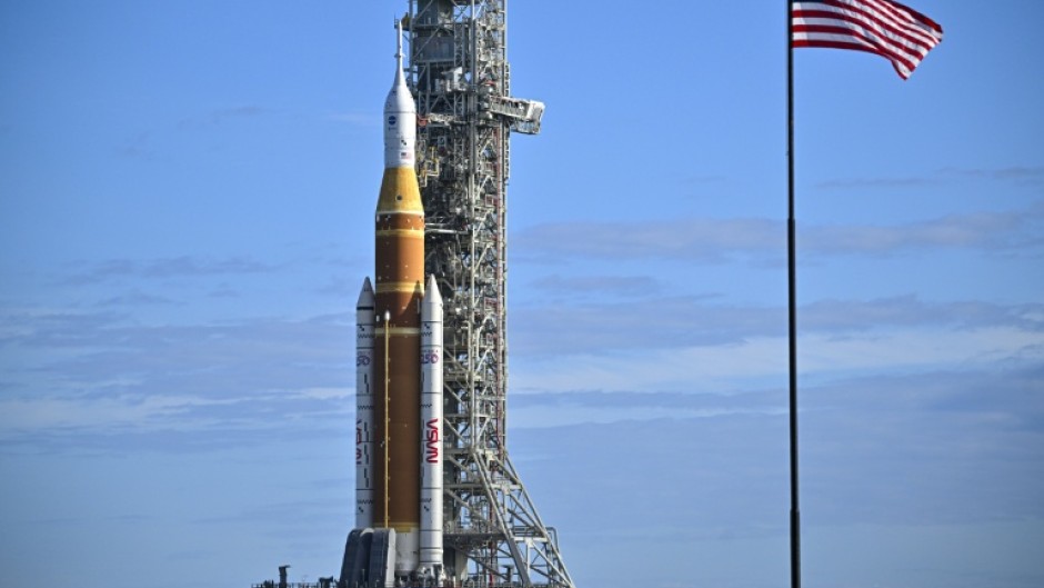 NASA's Artemis II Space Launch System rocket and Orion spacecraft are rolled out to Launch Pad 39B at Kennedy Space Center in Florida ahead of a crewed lunar mission