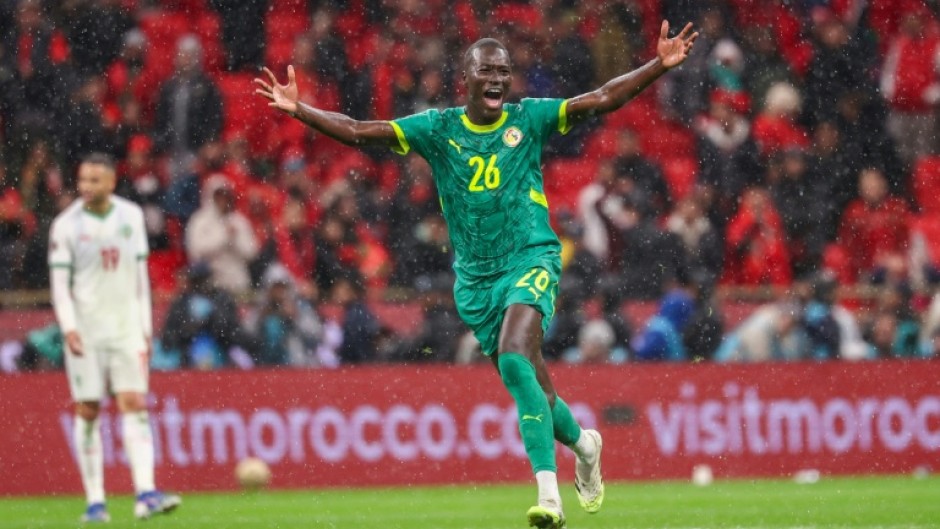 Match-winner Pape Gueye celebrates after Senegal won the 2025 Africa Cup of Nations final against Morocco