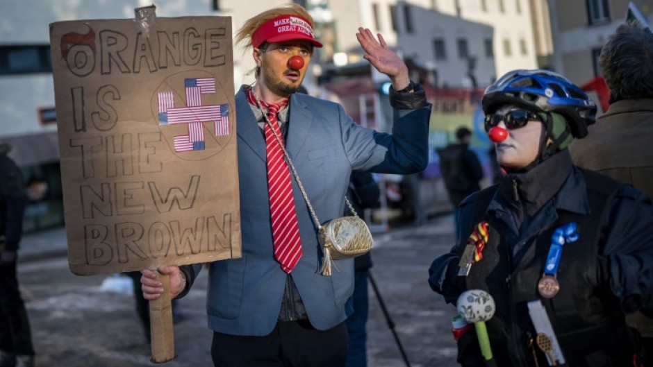 Protesters gather in Davos on Sunday ahead of the opening of the World Economic Forum