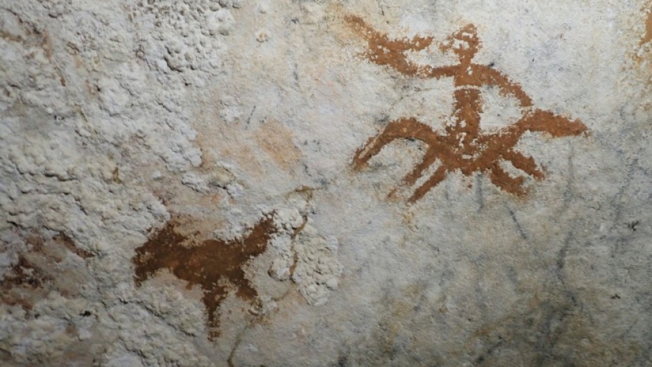 The cave art dates back at least 67,800 years, according to research published in the journal Nature