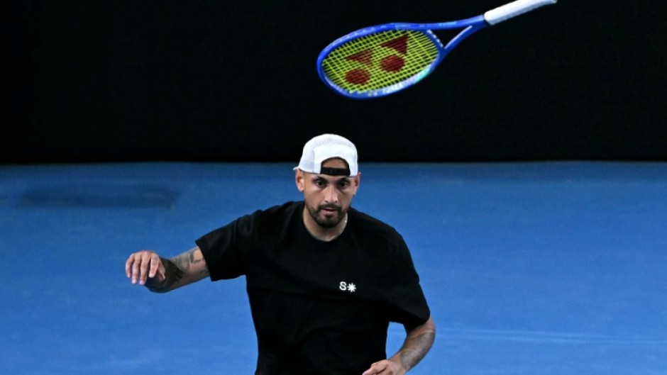 Australia's Nick Kyrgios throws his racket during his men's doubles match on Thursday