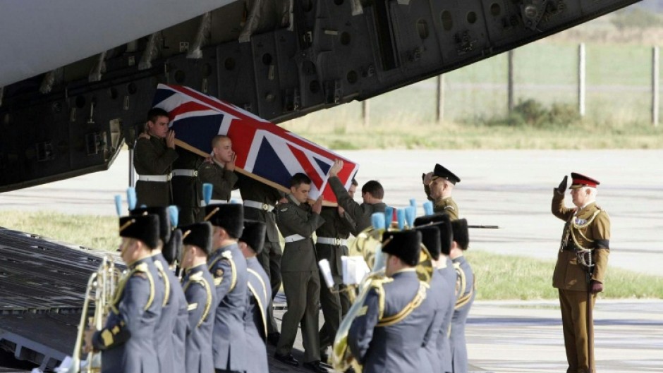 The coffin containing Joseph David Windall of the British Royal Marines arrived at a base in Scotland on September 12, 2006 after he was one of 14 British servicemen killed in Afghanistan in an air crash