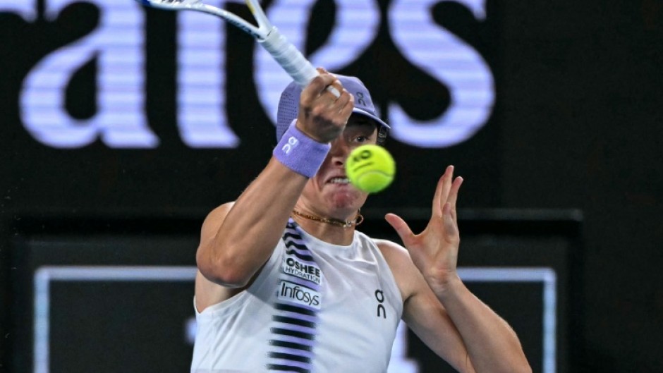 Poland's Iga Swiatek hits a shot against Russia's Anna Kalinskaya