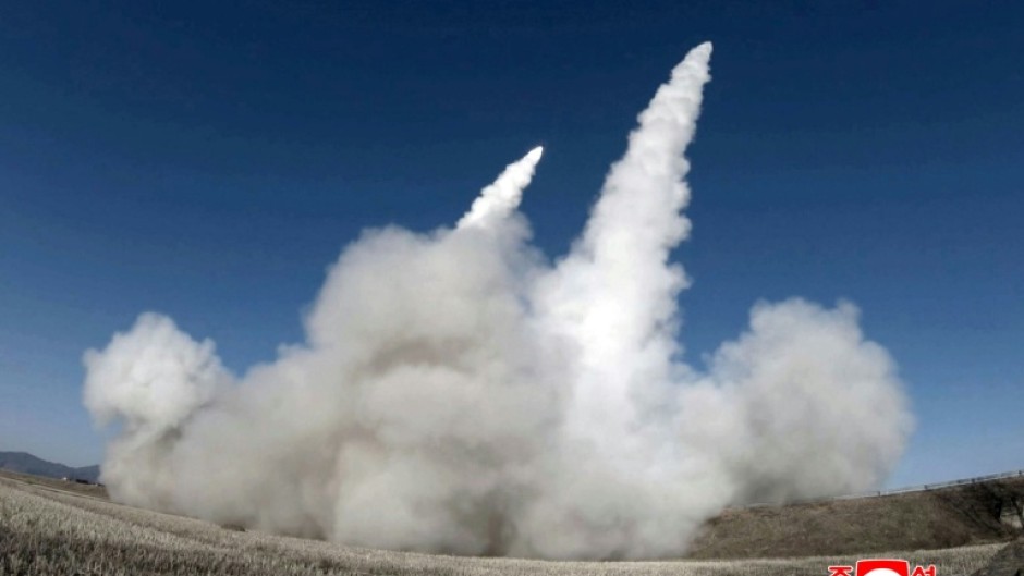 This picture taken on January 27, 2026 and released by North Korea's official Korean Central News Agency (KCNA) on January 28, 2026 shows a test firing of the renewed large-caliber rocket launcher system