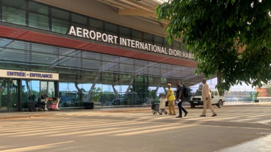 Gunfire and explosions erupted overnight near Diori Hamani International airport in Niamey