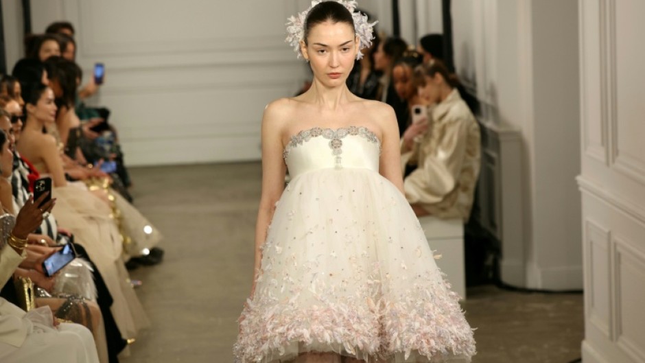 Designer Phan Huy's light muslin and tulle fabric dazzled a celebrity audience in Paris