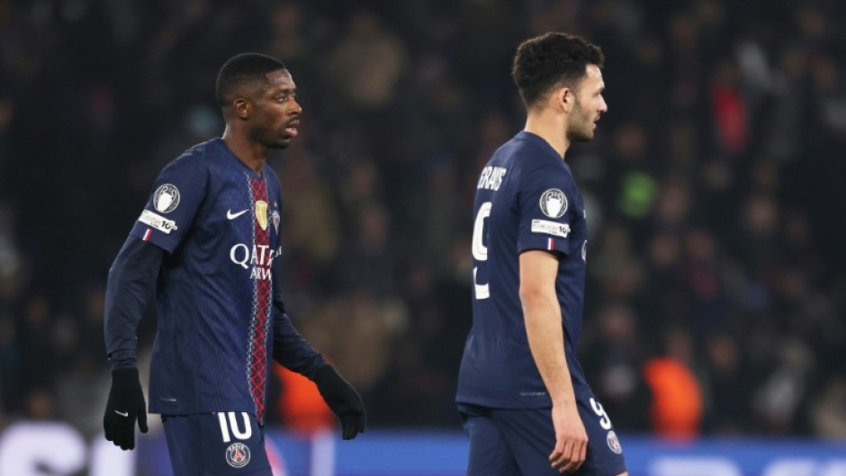 Paris Saint-Germain's Ousmane Dembele (L) and Goncalo Ramos pictured at the end of Wednesday's 1-1 draw with Newcastle United which condemned both teams to have to enter the knockout phase play-offs in this season's Champions League