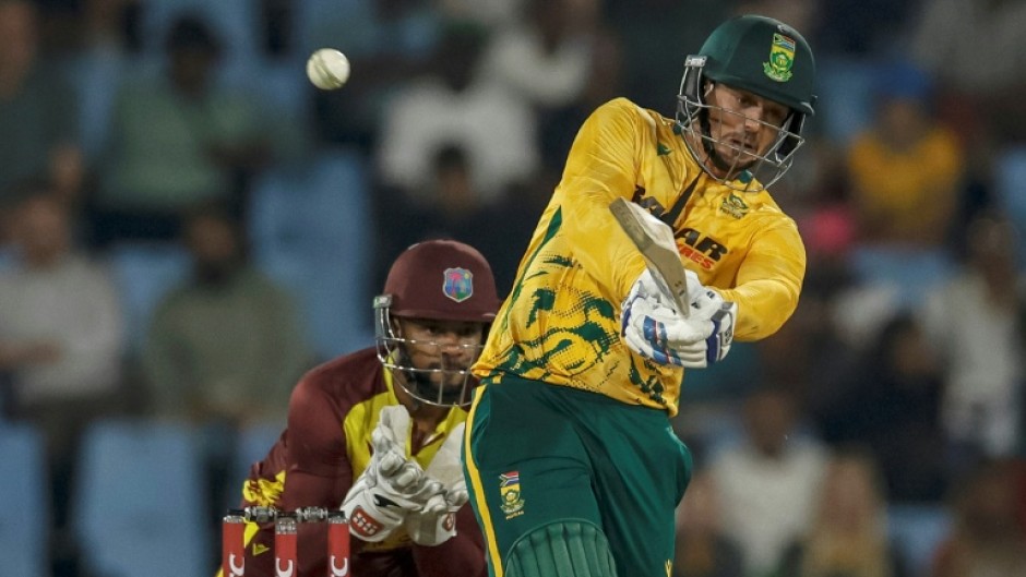 South Africa's Quinton de Kock (R) hit six fours and 10 sixes in making a career-best 115 off 49 deliveries