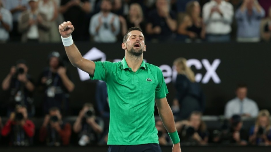 Serbia's Novak Djokovic celebrates victory over Italy's Jannik Sinner