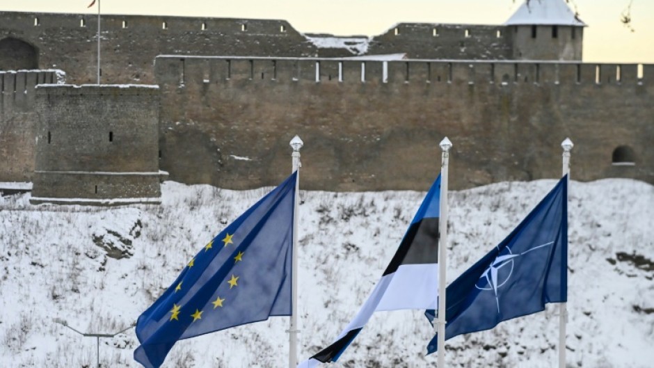 Two medieval fortresses face each other across the Narva River separating Estonia from Russia on Europe's eastern edge
