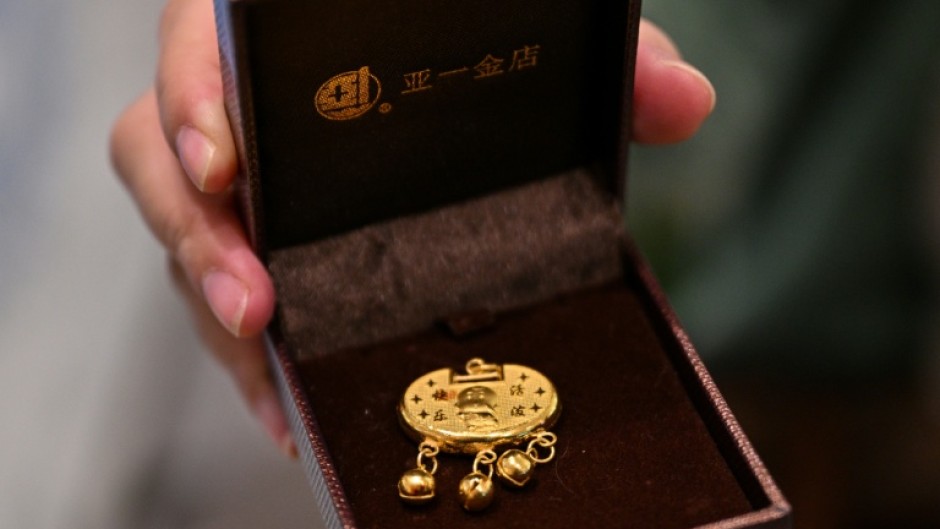 Chinese families traditionally purchase gold to mark special occasions like births and weddings