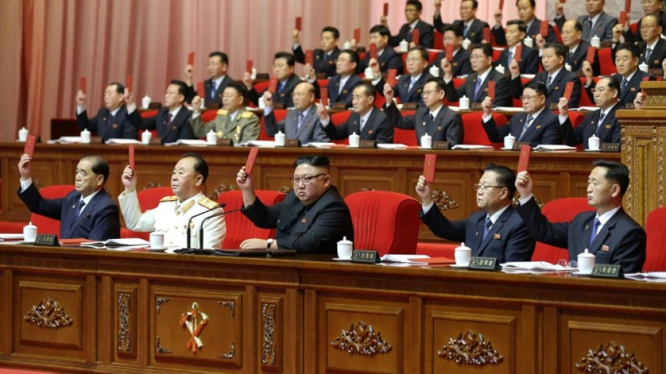 During the last ruling party congress in North Korea, Kim Jong Un (C) was named general secretary, resurrecting a title previously held by his late father