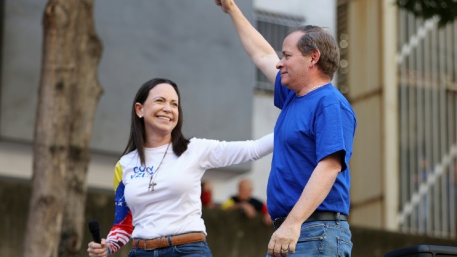 Juan Pablo Guanipa (R), who is close to Venezuelan opposition leader Maria Corina Machado, has been released from prison