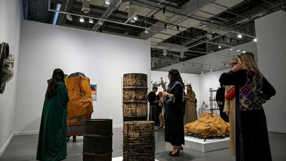 Visitors admiring the works of Bulgarian artist Christo