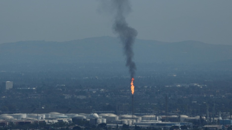 Dozens of cases against oil copmanies modeled on successful actions against the tobacco industry in the 1990s are playing out in state and local courts -- including claims of injuries, failure-to-warn, and even racketeering