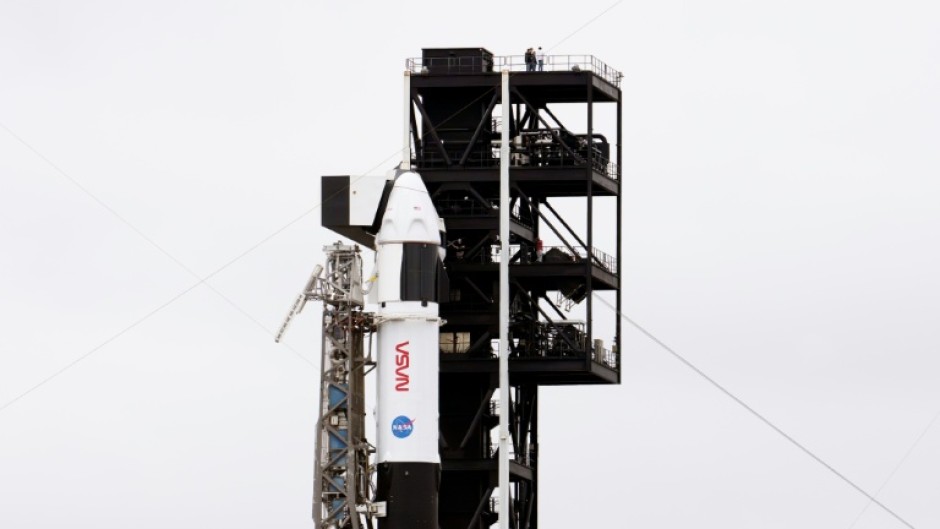A SpaceX Falcon 9 rocket with the company's Dragon spacecraft on top launches from Space Launch Complex 40 for the Crew-12 mission at Cape Canaveral Space Force Station in Florida
