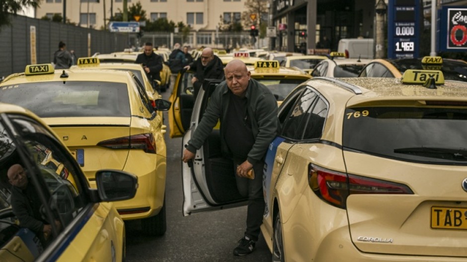 The Athens taxi drivers union opposes new rules they say favour private vehicles, warning of a "battle for survival"