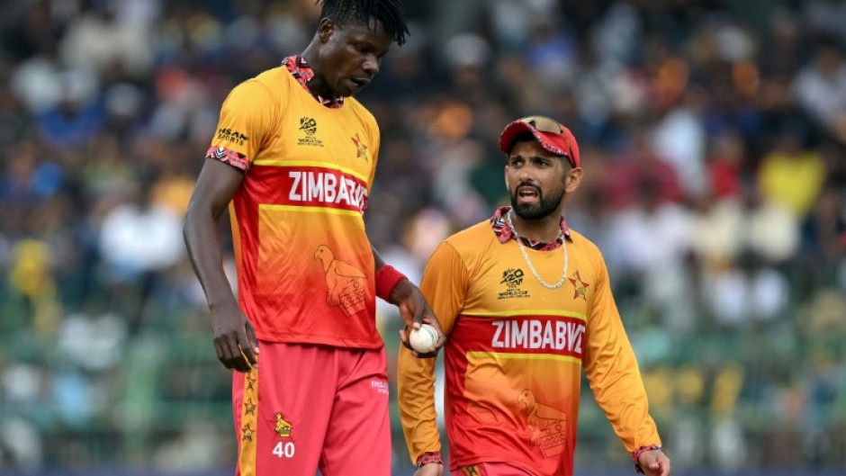 Zimbabwe captain Sikandar Raza (right) and quick bowler Blessing Muzarabani