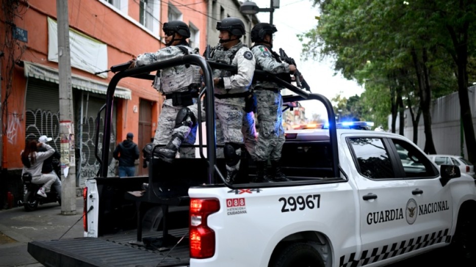 Mexico was on high alert with schools and courts closed and travelers stranded, after a powerful drug cartel's leader was killed
