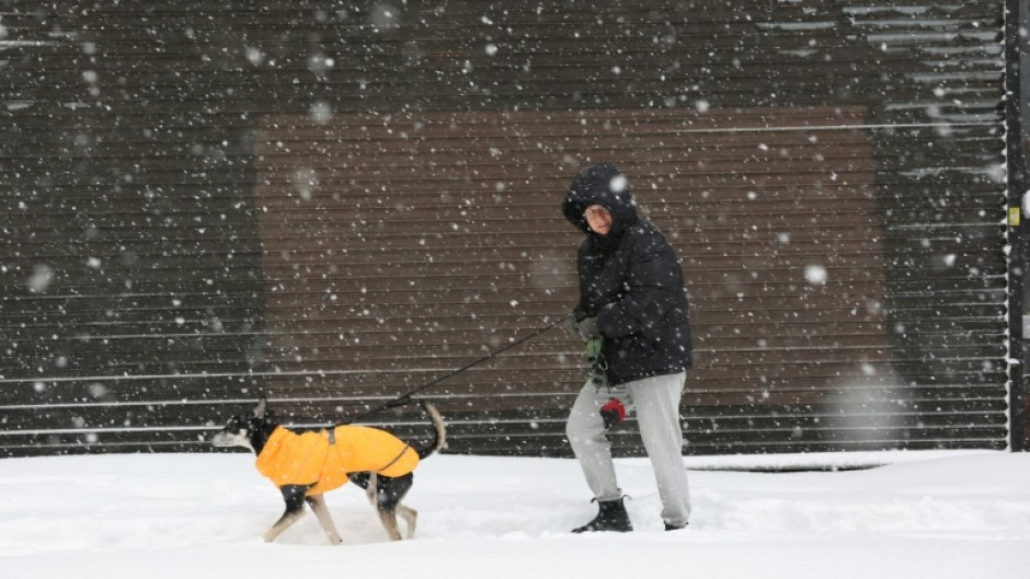 Authorities in New York, New Jersey and Rhode Island issued travel restrictions and shut schools