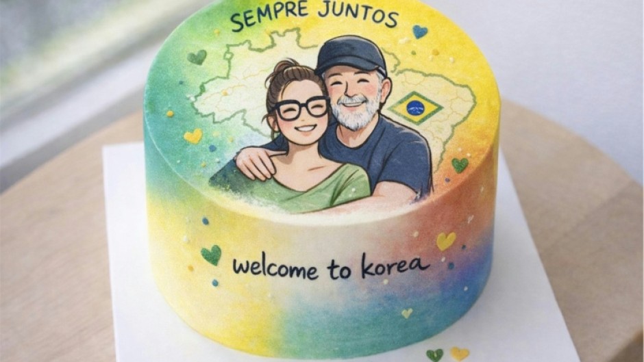 This undated handout photo released by the South Korean Presidential Office in Seoul shows a cake decorated with an illustration of Brazil's President Luiz Inacio Lula da Silva and his wife Rosangela da Silva to welcome their visit to South Korea