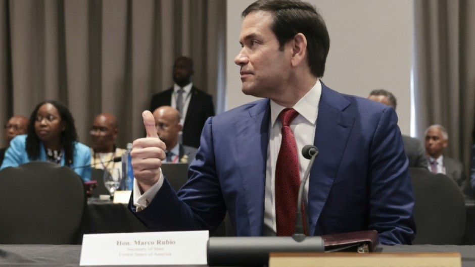 US Secretary of State Marco Rubio gives a thumbs up as he attends a Caribbean Community (CARICOM) plenary session in Basseterre, Saint Kitts and Nevis