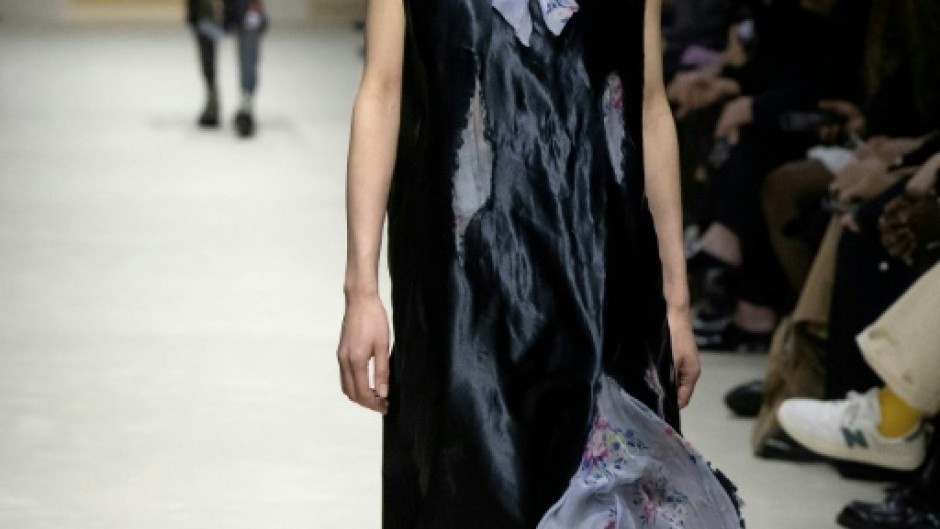 Distressed or "eaten away" fabrics were prevalent at Prada during Milan Fashion Week.