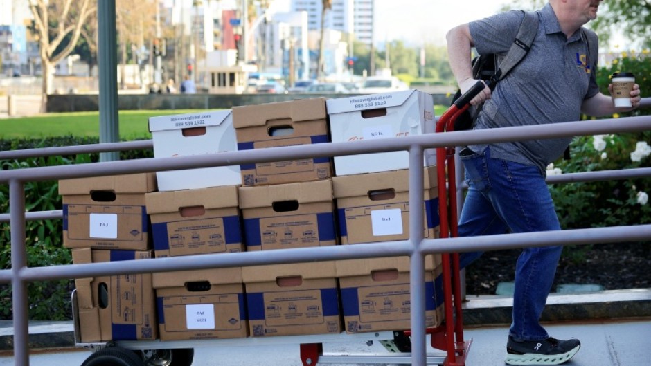 Boxes of documents are taken into Los Angeles Superior Court for a landmark social media trial