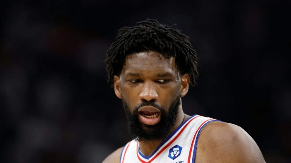 The Philadelphia 76ers say star center Joel Embiid will miss at least three games with an oblique strain