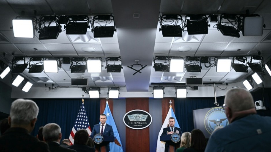 (L/R) US Defense Secretary Pete Hegseth and the Chairman of the Joint Chiefs of Staff General Dan Caine briefed reporters in Washington on the progress in the war