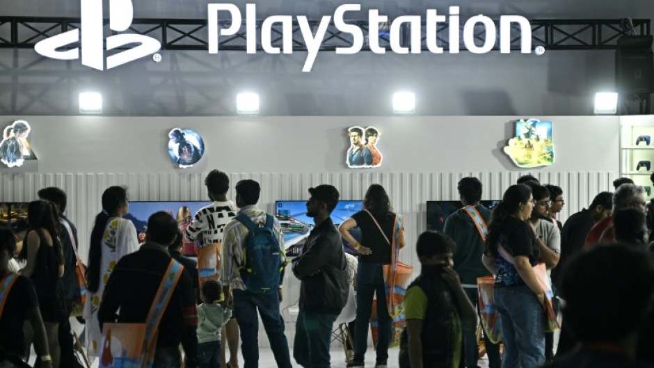 Visitors check out the PlayStation gaming stall during the Bengaluru Comic Con 2025 fest in Bengaluru on December 21, 2025