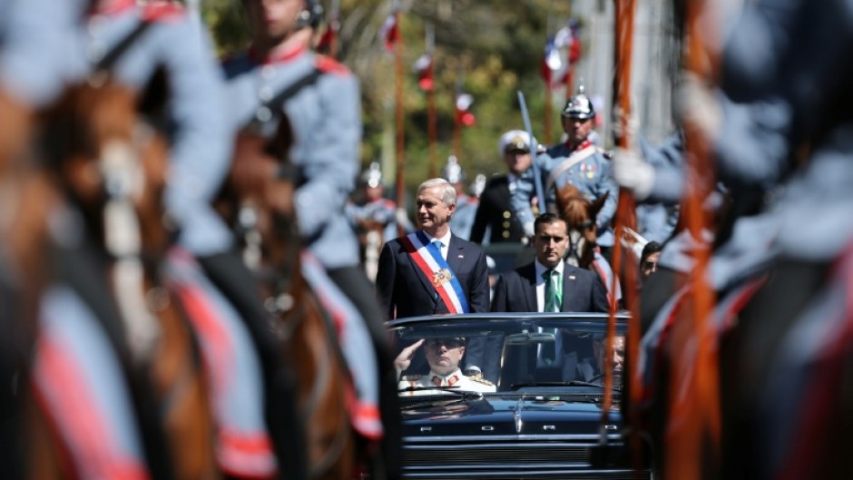 President Jose Antonio Kast leaves his inauguration ceremony in a convertible