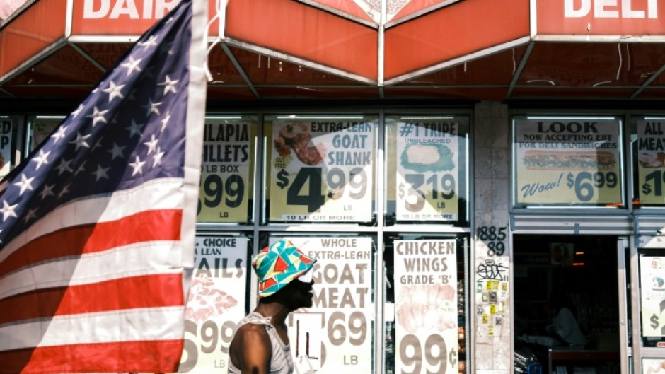 A person walks in the Little Haiti neighborhood in the Brooklyn borough of New York City on July 15, 2025