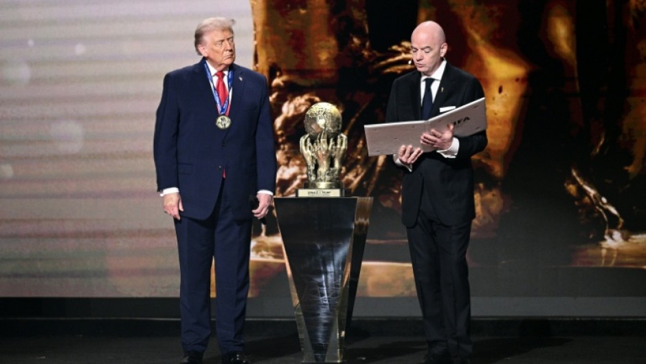 FIFA president Gianni Infantino (L) created a FIFA peace prize and awarded it to US President Donald Trump